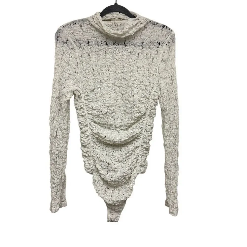 Free people white crotchet style long sleeve bodysuit size medium